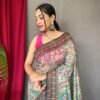 Close-up view of malai cotton saree with Kalamkari inspired print and detailed border