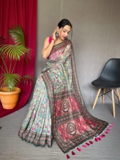 Malai cotton saree with Kalamkari inspired print, bold border and contrast tasselled pallu