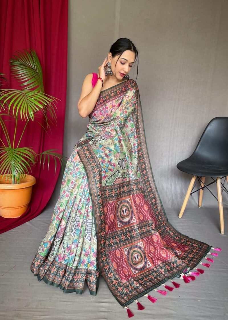 Malai cotton saree with Kalamkari inspired print, bold border and contrast tasselled pallu