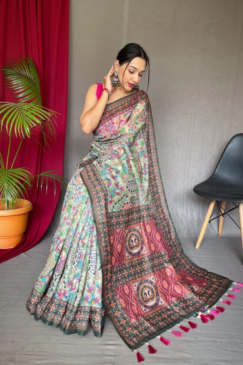 Malai cotton saree with Kalamkari inspired print, bold border and contrast tasselled pallu