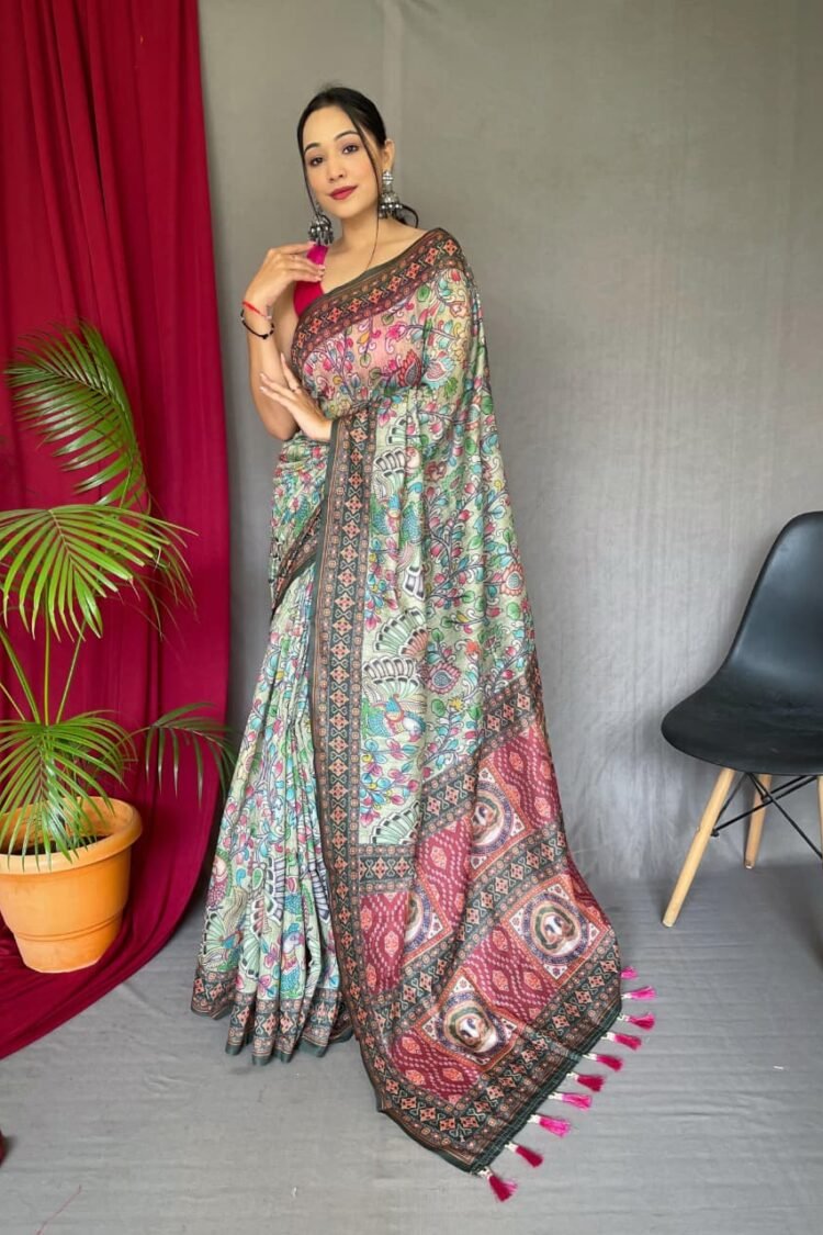 Malai cotton saree with Kalamkari inspired print, bold border and contrast tasselled pallu