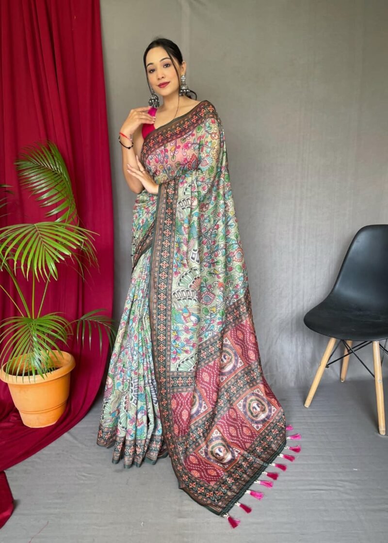 Malai cotton saree with Kalamkari inspired print, bold border and contrast tasselled pallu