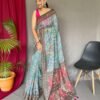 Sky blue malai cotton saree with Kalamkari inspired print, bold border and contrast tasselled pallu