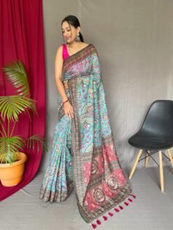 Sky blue malai cotton saree with Kalamkari inspired print, bold border and contrast tasselled pallu