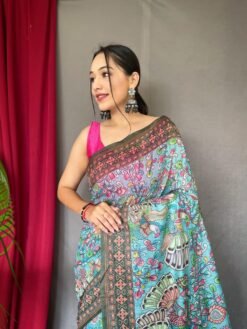 Close-up view of sky blue malai cotton saree with Kalamkari inspired print and detailed border