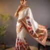 Elegant off-white pure Kanchipuram silk saree with floral motifs and rich woven border, fully stitched pallu, perfect for wedding and festive wear