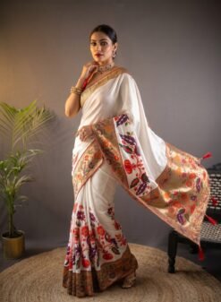 Elegant off-white pure Kanchipuram silk saree with floral motifs and rich woven border, fully stitched pallu, perfect for wedding and festive wear