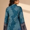 Back view of women’s teal blue printed bell sleeve shirt with white geometric pattern and decorative sleeve border detailing.