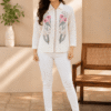 Full body view of women's white floral print shirt with pink floral design, collared neckline and three-quarter sleeves DS025
