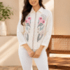 Women's white floral print shirt with pink floral design and collared neckline styled in a lifestyle setting DS025