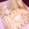 White Kanchipuram Silk Saree with Intricate Zari Border