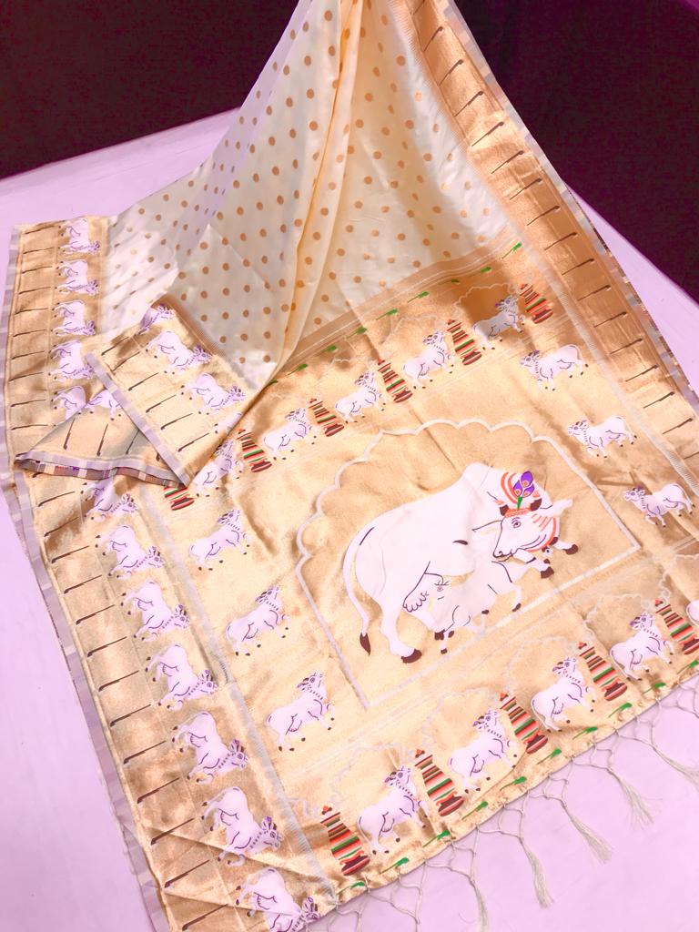 White Kanchipuram Silk Saree with Intricate Zari Border