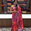 Pink party wear soft silk Banarasi Ikat Weaving saree with intricate ikat designs.