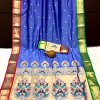 A royal blue Kanchipuram Paithani silk saree with a peacock design.