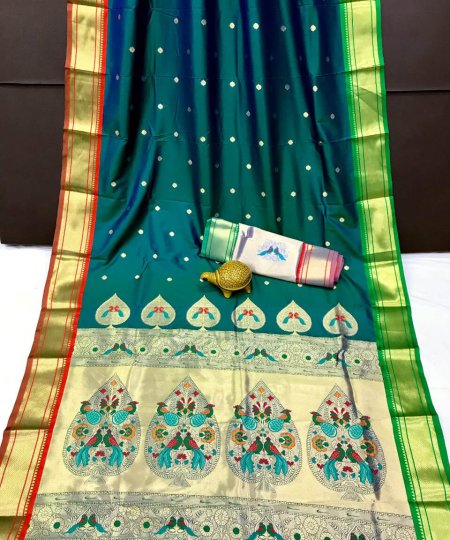 A sea green Kanchipuram Paithani silk saree with a peacock design.