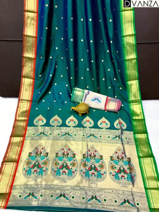 A sea green Kanchipuram Paithani silk saree with a peacock design.