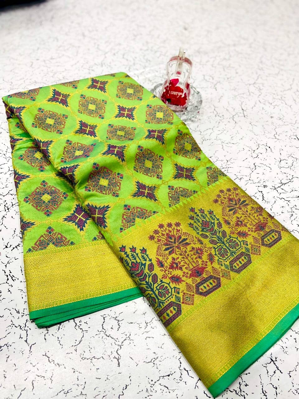 green soft banarasi patola silk saree with reach pallu dvz0002015