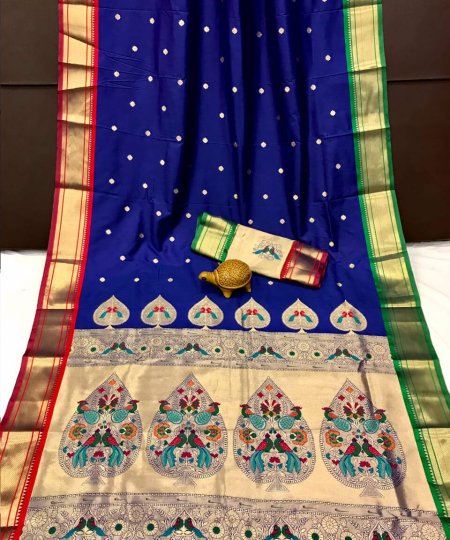 A navy blue Kanchipuram Paithani silk saree with a peacock design.